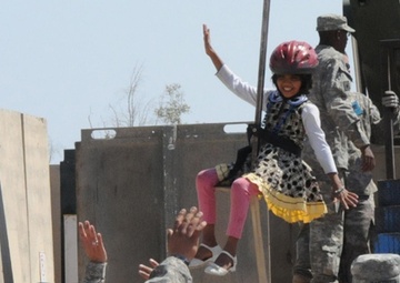 Bringing smiles to Iraqi kids: Iraqi Kids Day brings US personnel, Iraqi locals together