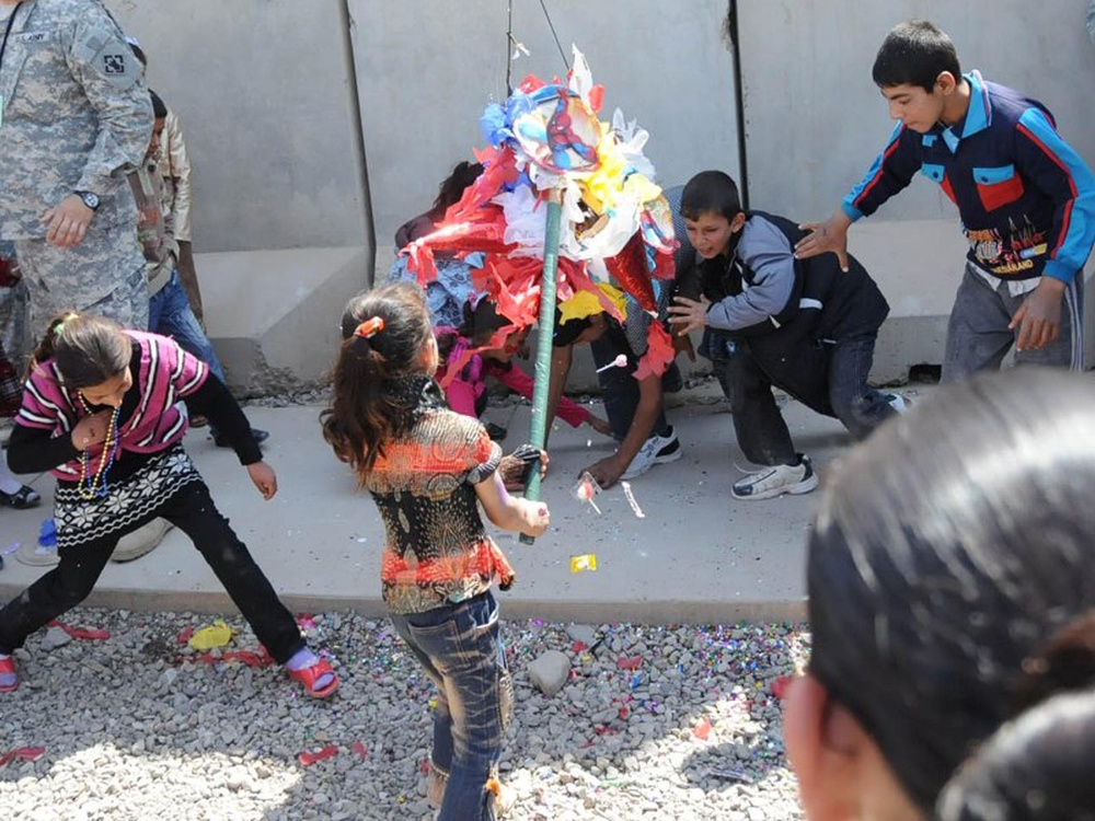Bringing smiles to Iraqi kids: Iraqi Kids Day brings US personnel, Iraqi locals together