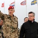 German Minister of Defence walks with the ISAF Regional Command North commander