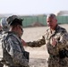 A German Soldier shares tactical knowledge with American combat Troops