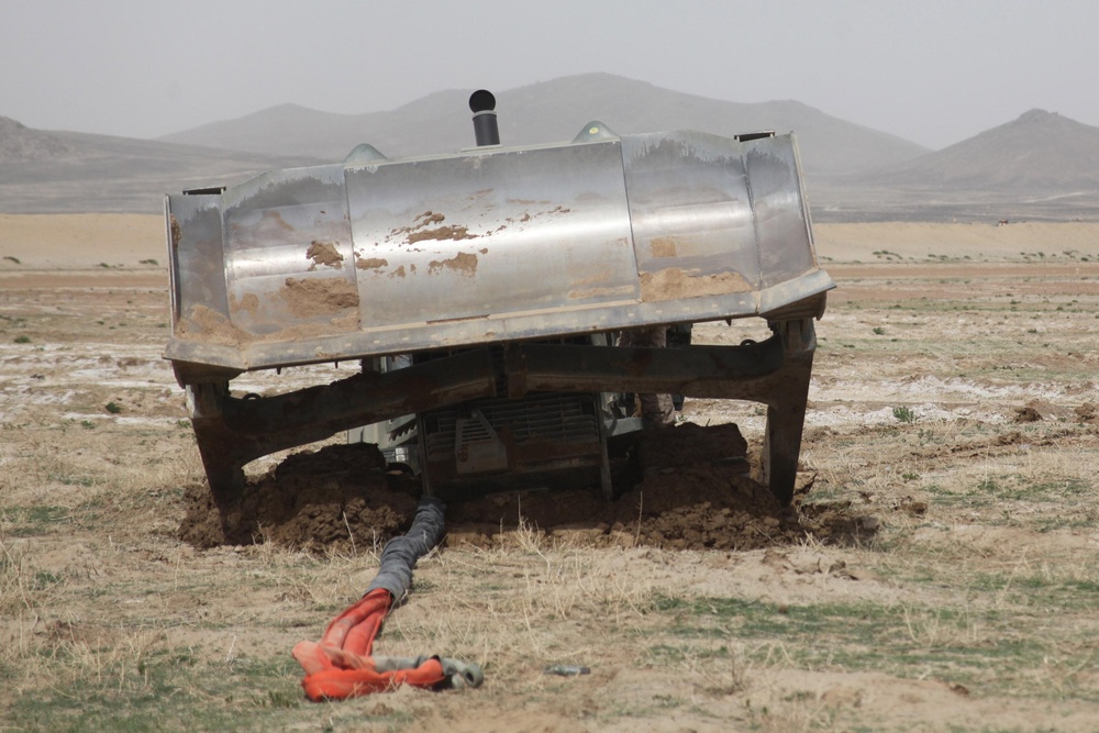 Bulldozer stuck in mud