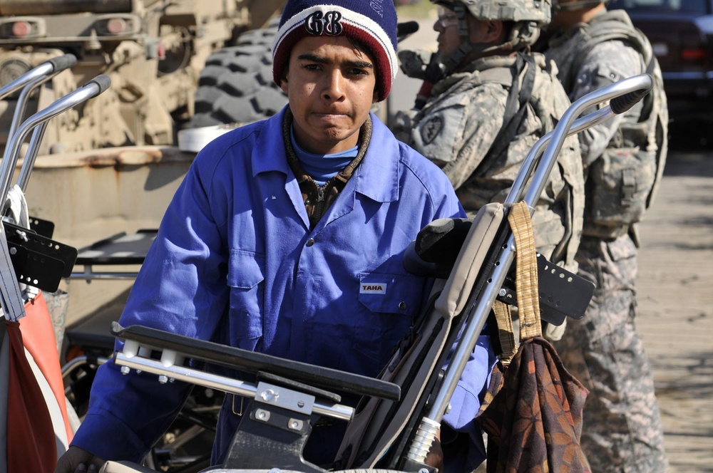 Wolfhounds,' PRT deliver pediatric wheelchairs to Tikrit Rehabilitation Hospital