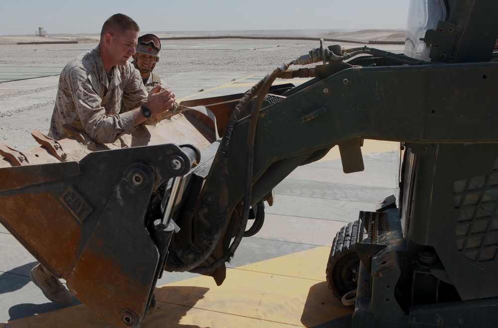 Helicopter support team sends heavy equipment via air