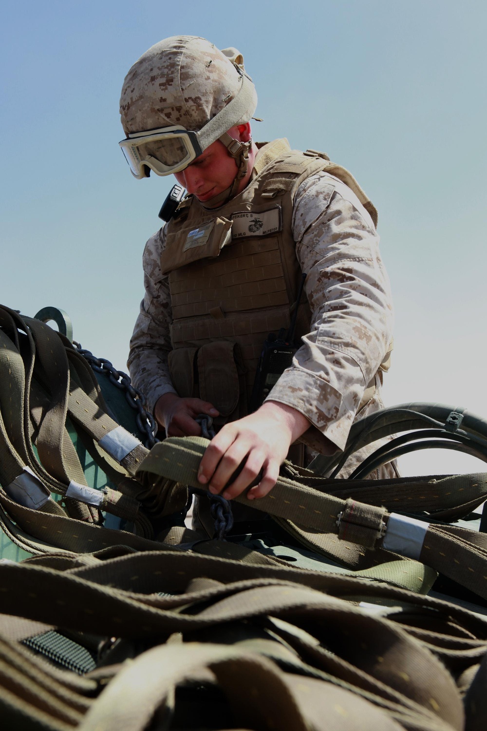 Helicopter support team sends heavy equipment via air