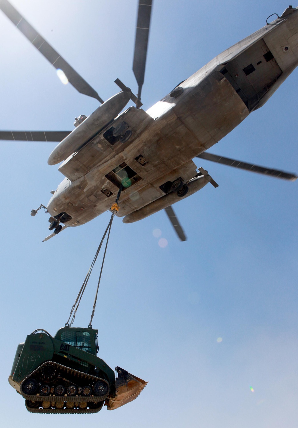 Helicopter support team sends heavy equipment via air