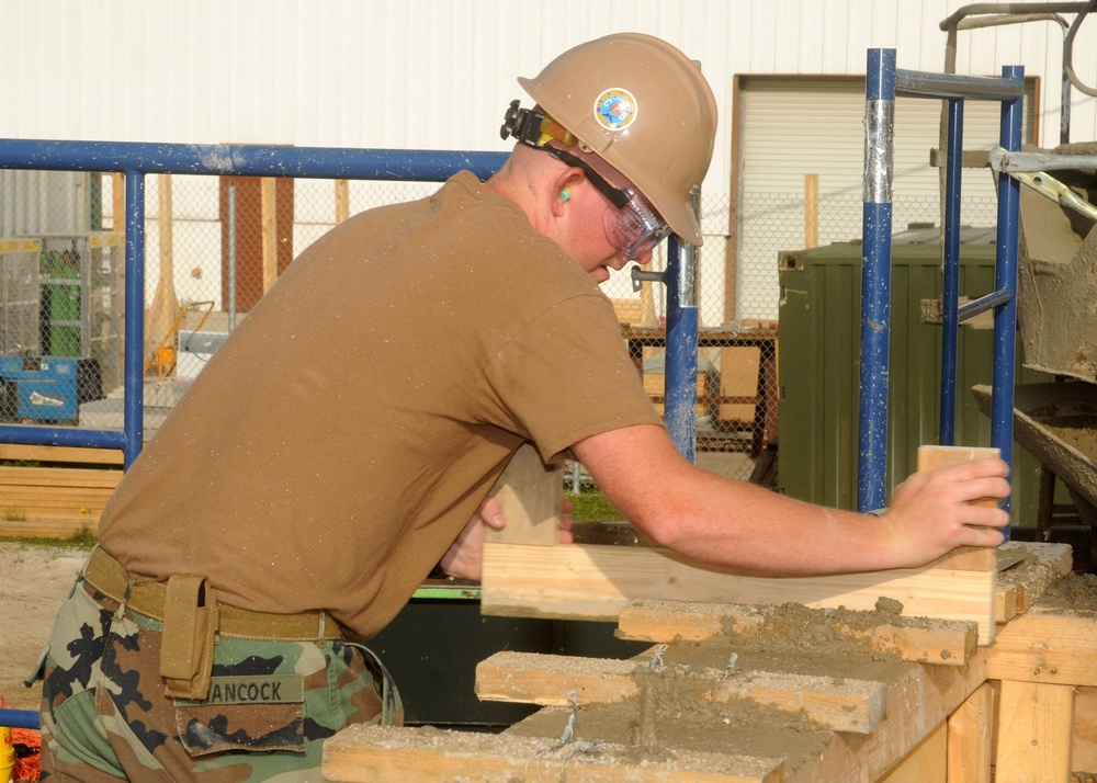 NMCB 74 Seabees Execute Overhead Pour at Camp Mitchell