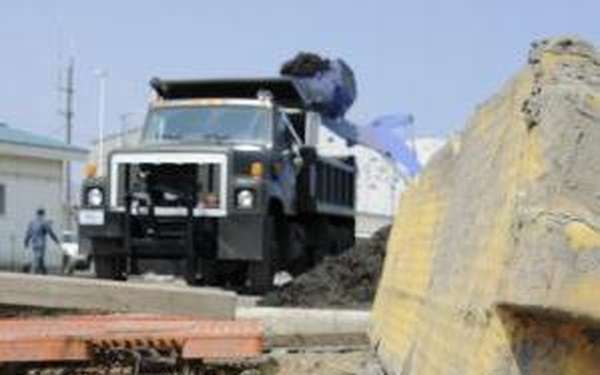 Japanese Military, City Workers Help with Naval Fuel Station Cleanups