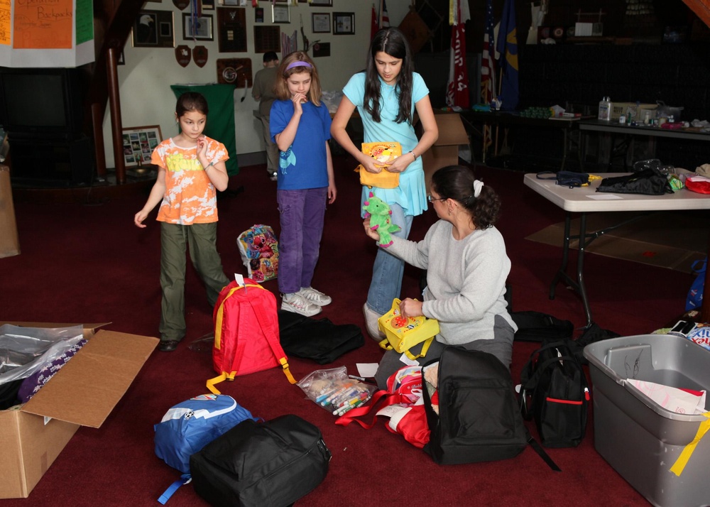 Scouts fill backpacks for displaced youth in Sendai