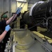 USS Ronald Reagan Sailors Work on Jet Engine