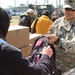 Scouts fill backpacks for displaced youth in Sendai