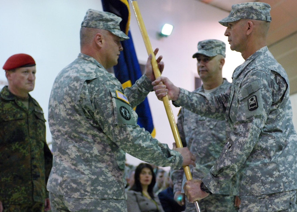 Outgoing command passes colors during transfer of authority ceremony in Kosovo