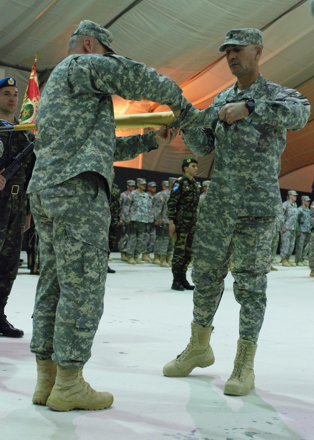 Outgoing Puerto Rican National Guard command cases their colors during transfer of authority ceremony