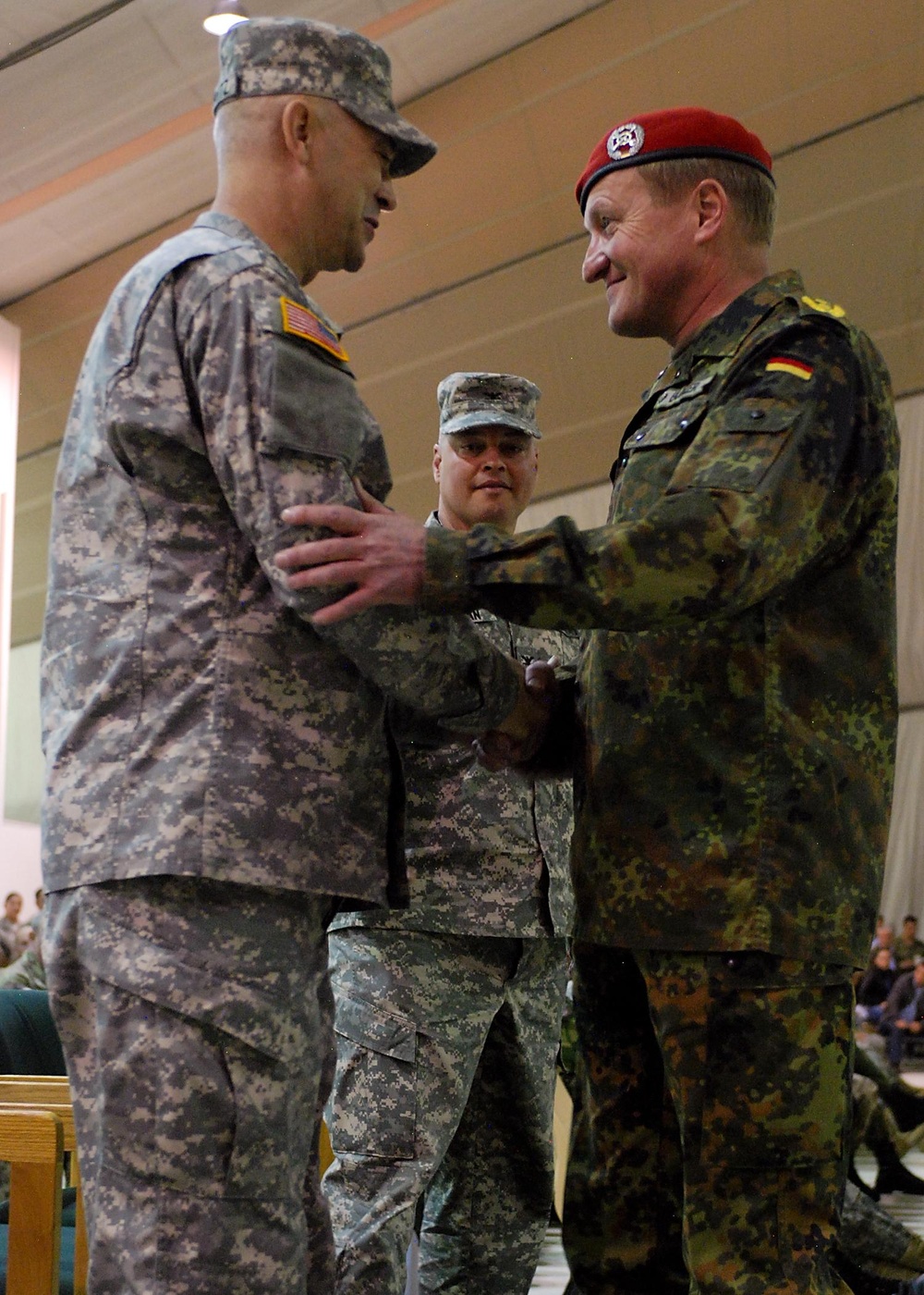 Kosovo Forces commander congratulates incoming Multinational Battle Group-East commander during transfer of authority ceremony