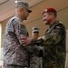 Kosovo Forces commander congratulates incoming Multinational Battle Group-East commander during transfer of authority ceremony