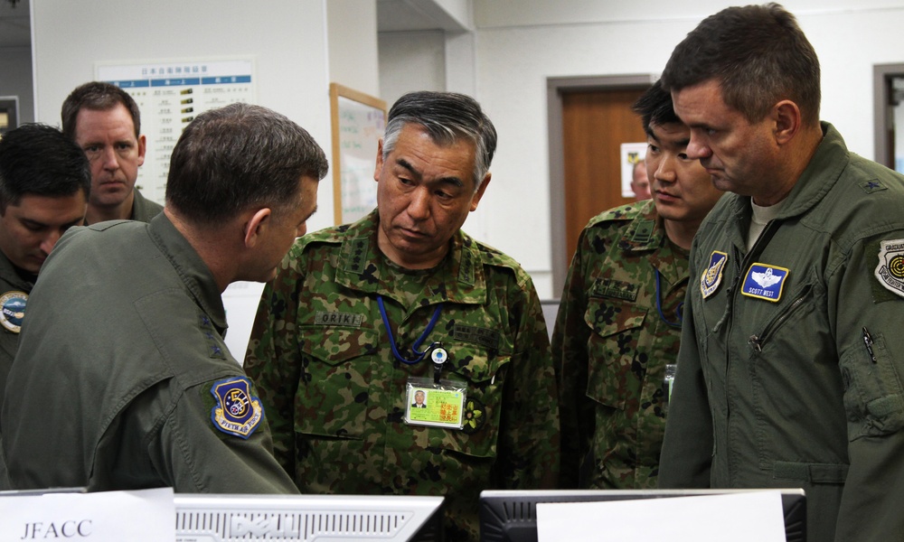 Gen. Ryoichi Oriki, Chief of Staff, Joint Staff Japan, is provided a tour