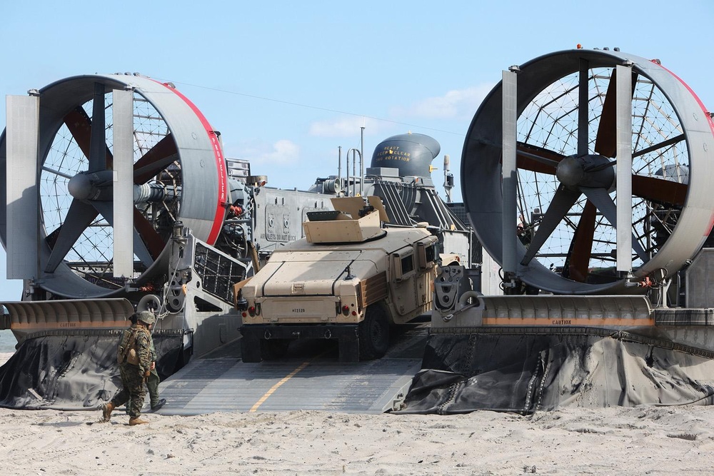 22nd MEU Marines load vehicles aboard landing craft