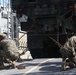 22nd MEU Marines load vehicles aboard landing craft