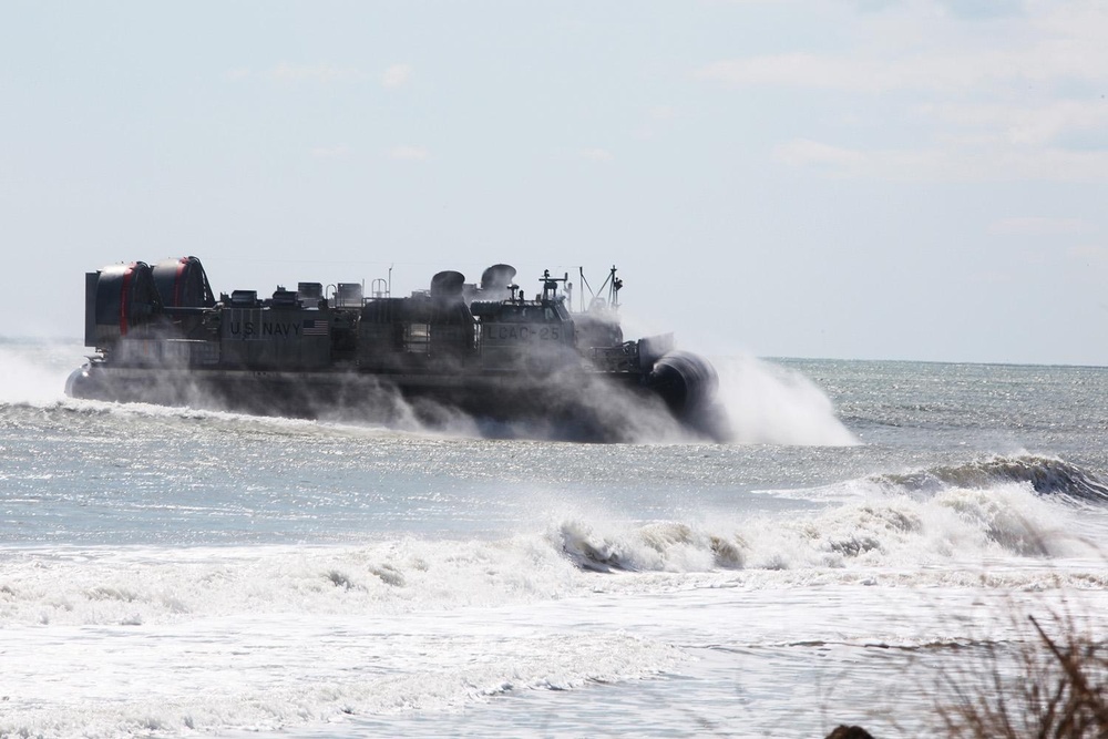 22nd MEU Marines load vehicles aboard landing craft