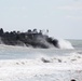 22nd MEU Marines load vehicles aboard landing craft