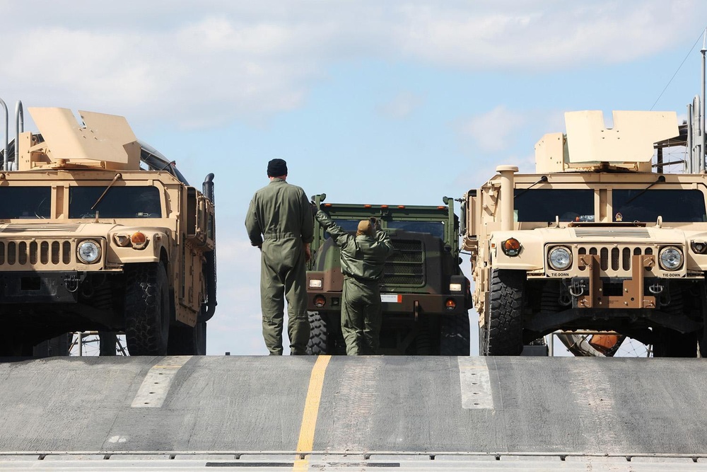 22nd MEU Marines load vehicles aboard landing craft