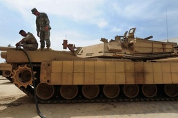 1st Bn., 18th Inf. Regt. Soldiers work with 9th IA Div. on medical tasks, tanks