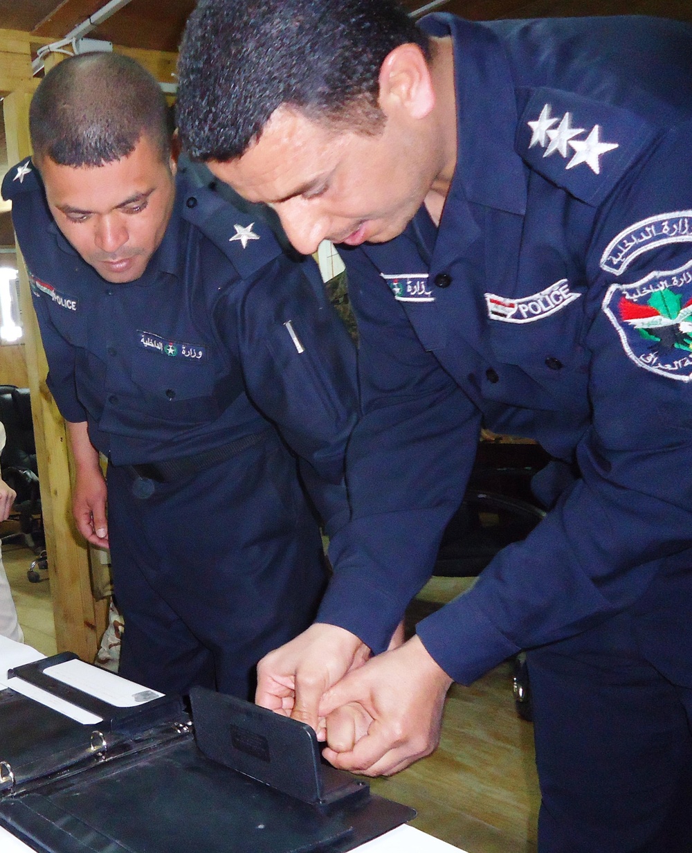 Law enforcement professional with 'Dragon' Battalion trains ISF on investigative techniques