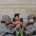 Vanguard Brigade Soldiers help distribute wheelchairs to disabled Iraqi children