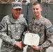 Petraeus decorates soldier with Purple Heart