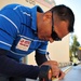 Sailor Builds Bulletin Board During Community Outreach Project