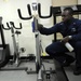 USS Tortuga Sailor Cleans Gym