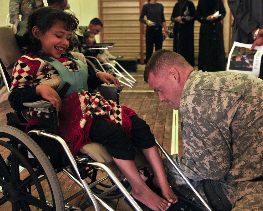 'Wolfhounds,' PRT deliver pediatric wheelchairs to Tikrit Rehabilitation Hospital