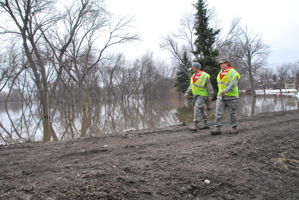 Guard dike patrolling new job for some, old hat for others