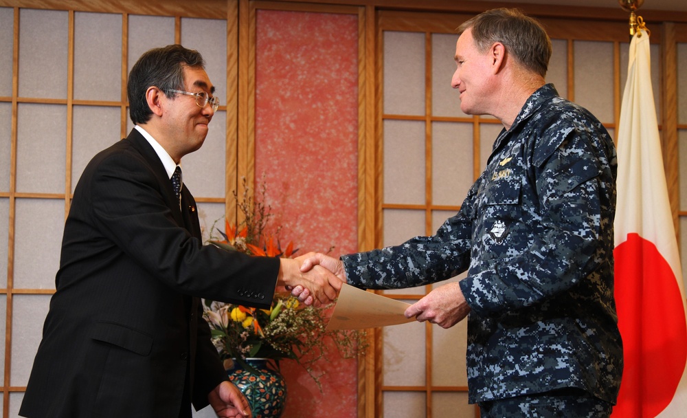 Japan Minister of Foreign Affairs, Takeaki Matsumoto, presents a farewell gift along with words of appreciation to Adm. Patrick M. Walsh