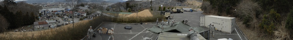 Washing it all away: soldiers, JSDF provide showers for tsunami victims