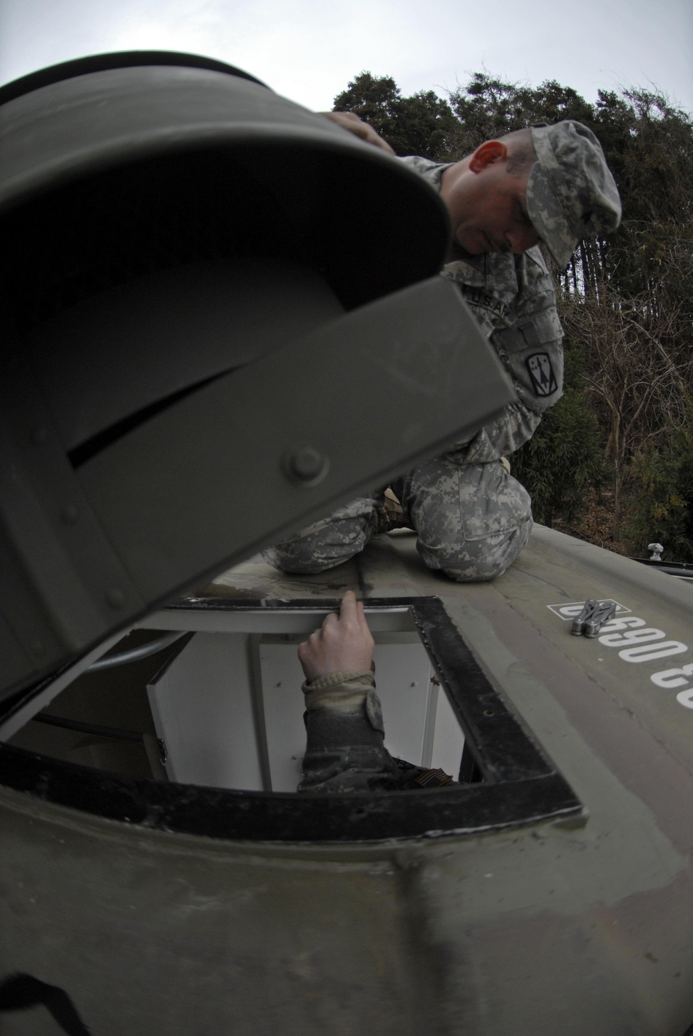 Washing it all away: soldiers, JSDF provide showers for tsunami victims