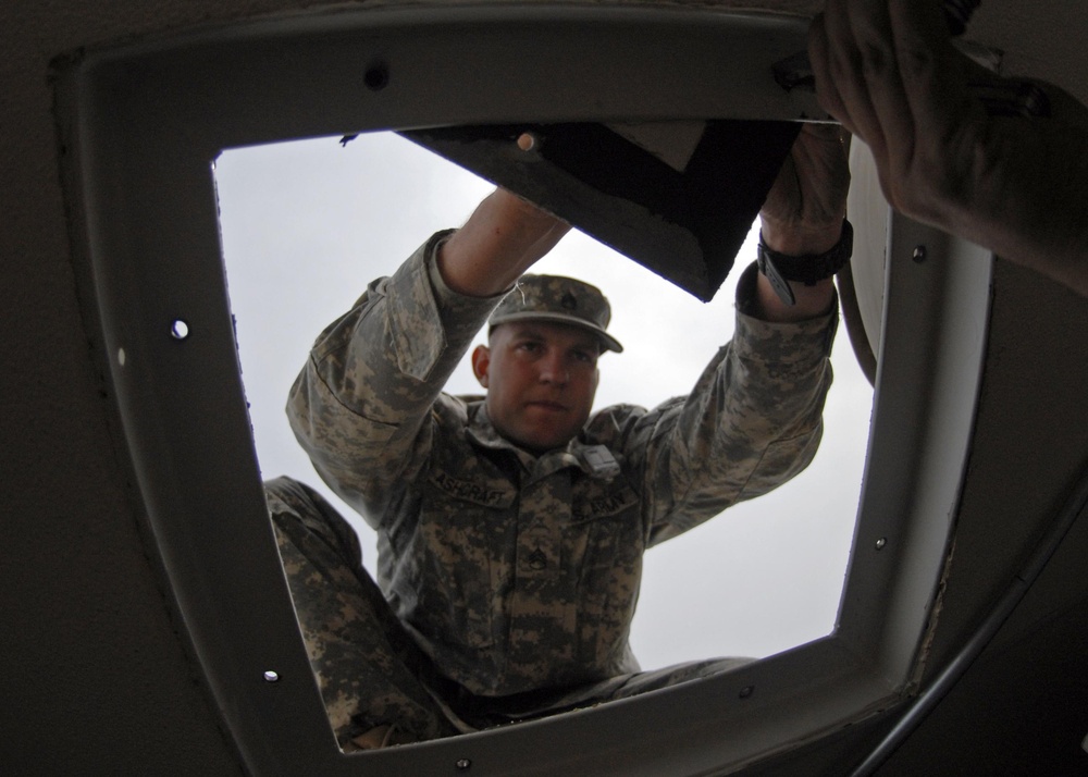 Washing it all away: soldiers, JSDF provide showers for tsunami victims