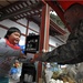 For the Children: soldiers give candy to tsunami victims
