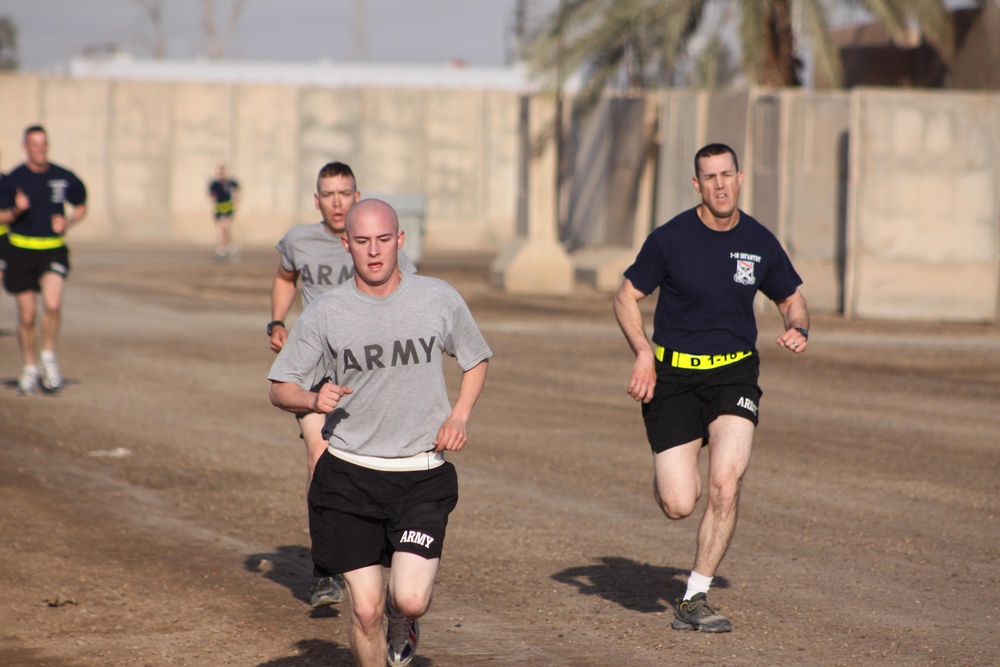 Spc. Thomas races to Beat Coach Pete at Camp Taji