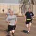 Spc. Thomas races to Beat Coach Pete at Camp Taji