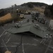 US Soldiers build showers for tsunami victims