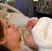 Bagram Airman meets his first born via the Internet