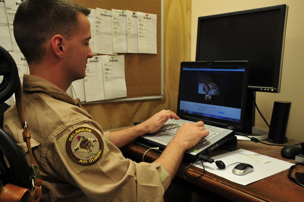Bagram Airman meets his first born via the Internet