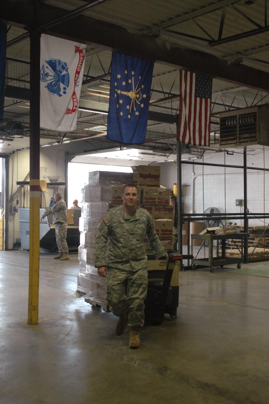Girl Scouts deliver cookies to troops at Camp Atterbury