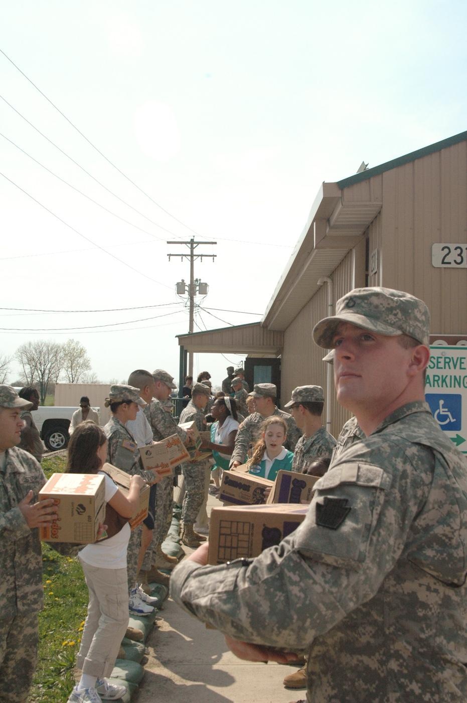 Girl Scouts deliver cookies to troops at Camp Atterbury