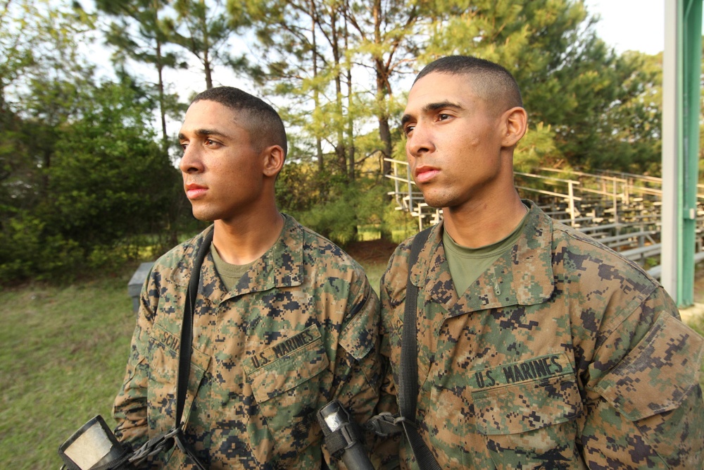 Twin brothers earn title together