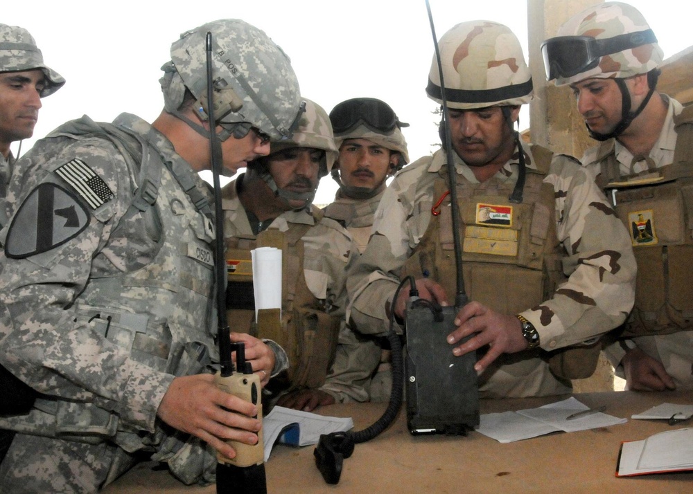US Army system specialists train IA to be proficient signal soldiers