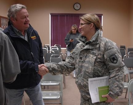 Governor and First Lady Visit Guardsmen Helping in Valley City