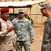 ‘Vanguard’ Battalion, 11th Iraqi Army Division senior enlisted leaders tour headquarters, share meal