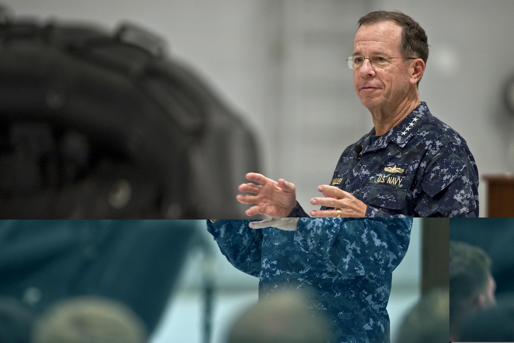 CJCS Navy Adm. Mike Mullen presents pararescuemen with bronze stars