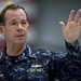 CJCS Navy Adm. Mike Mullen presents pararescuemen with bronze stars